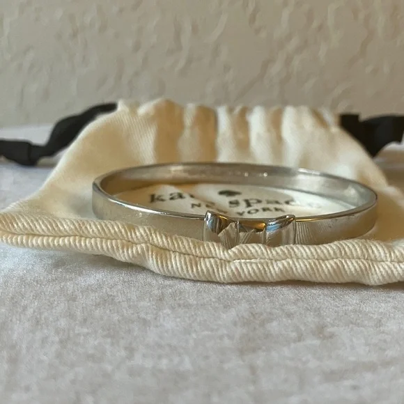 Kate Spade: Silver Tone Bow Bracelet- Marks - Picture 13 of 16